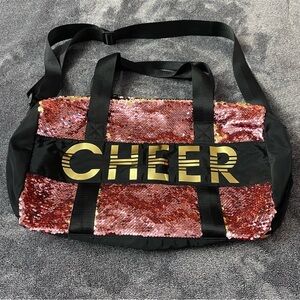 Justice Sequin Cheer bag black and Pink.
